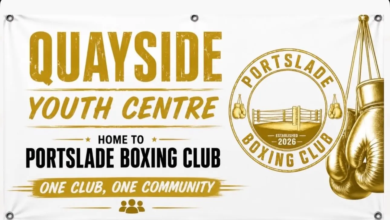 A banner reading Quayside Youth Centre, home to Portslade Boxing Club, one club, one community